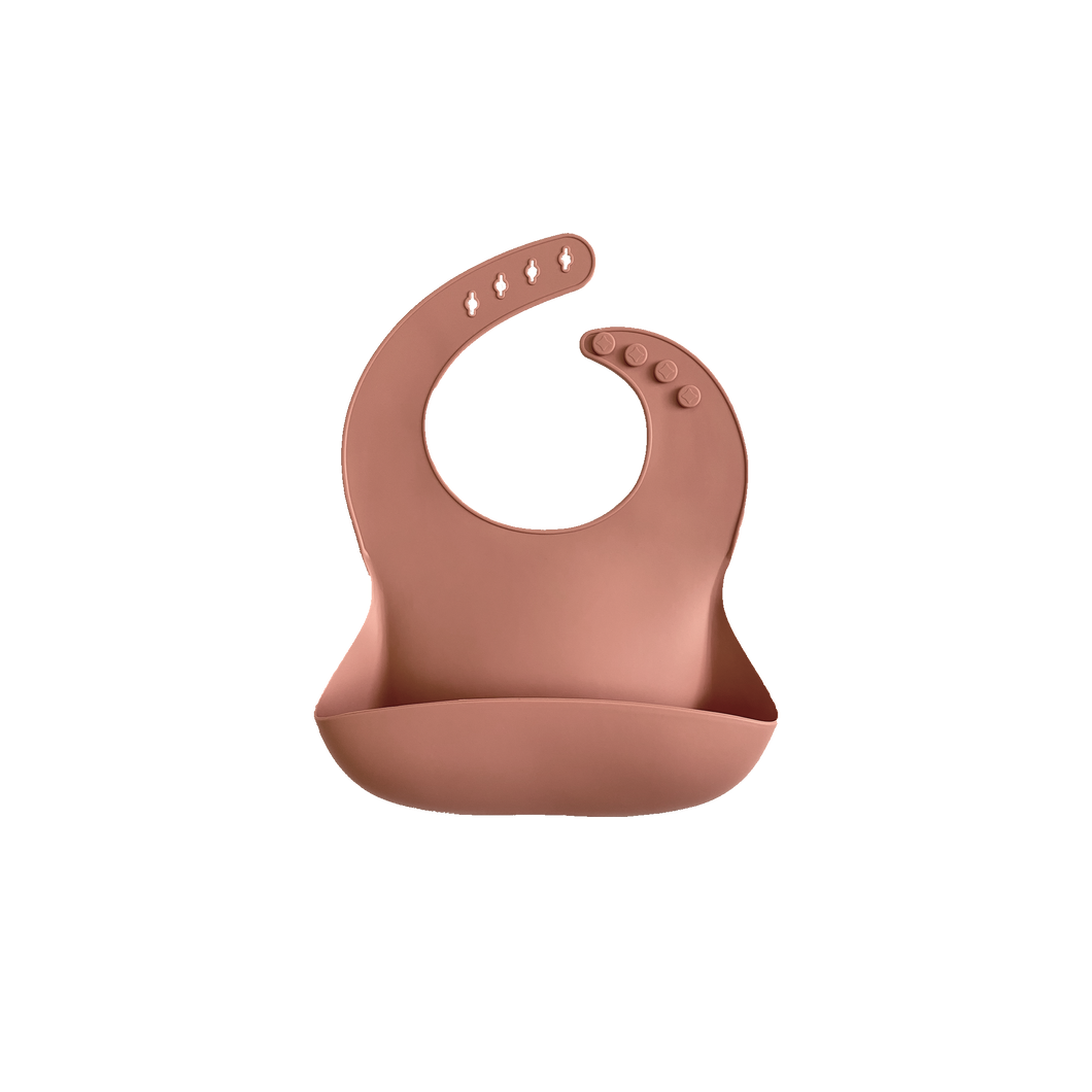 Silicone Bib in Sunrise Pink from Bubs Playground and Bubs Eats